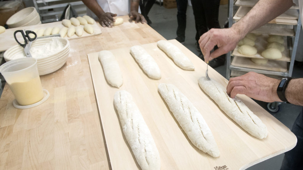 Bread being prepared in a bakery